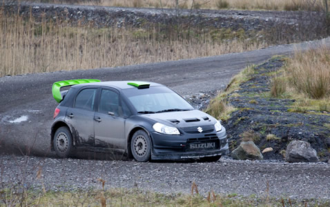 Neil Armstrong testing the Suzuki SX4 WRC